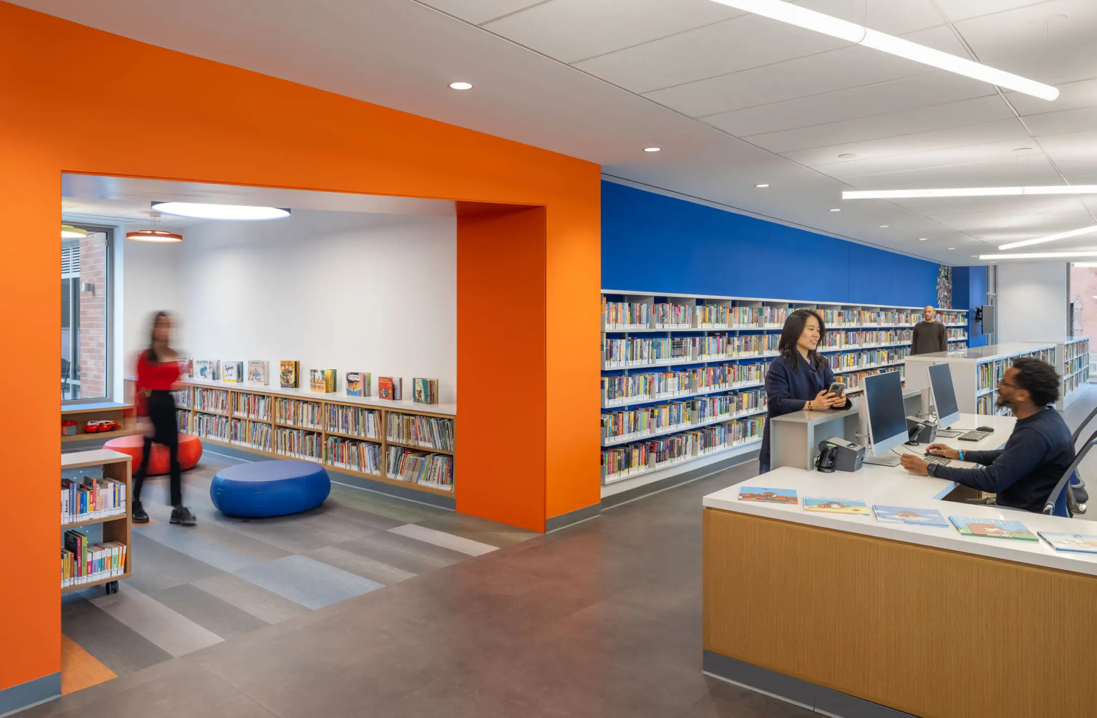 Rendering of People walking around library with orange highlight archway and dark blue walls