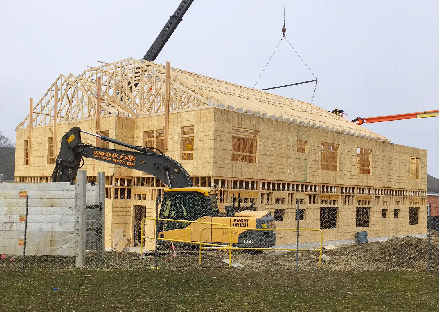 Wood skeleton of pomfret school health and wellness center under construction