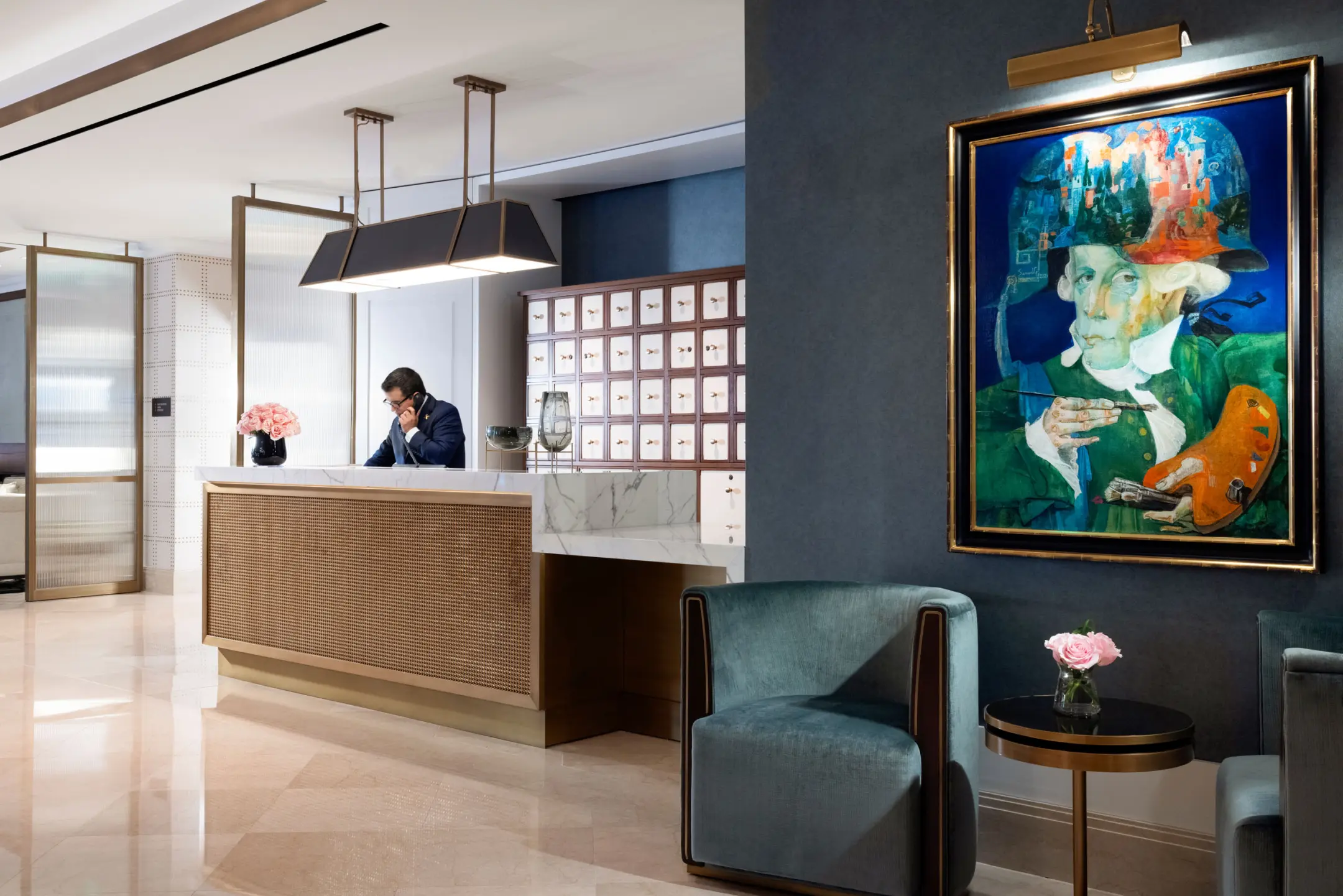 Concierge standing at desk