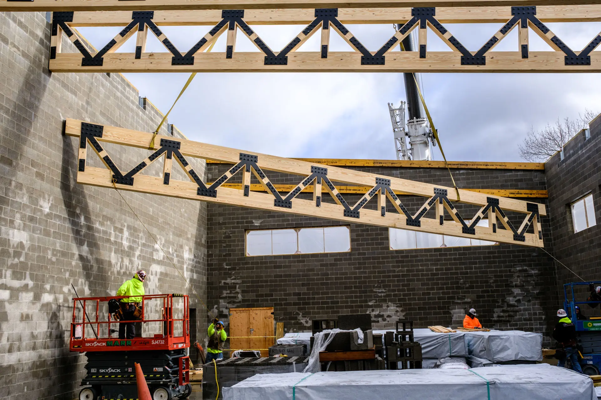 Timber trusses being placed in roof at Eden Park Elementary School