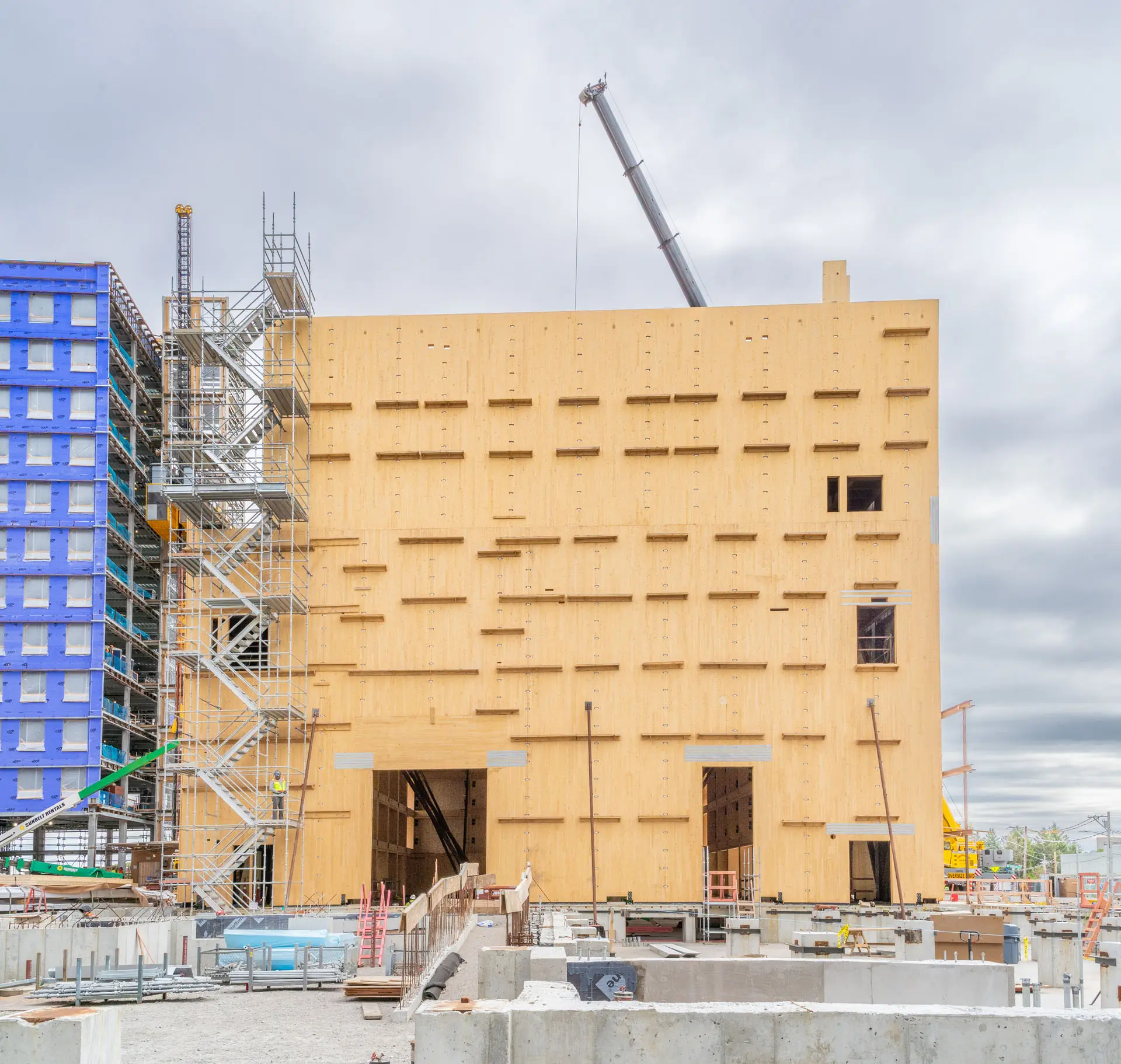 Exterior of wooden framed Harvard University American Repertory Theatre under construction