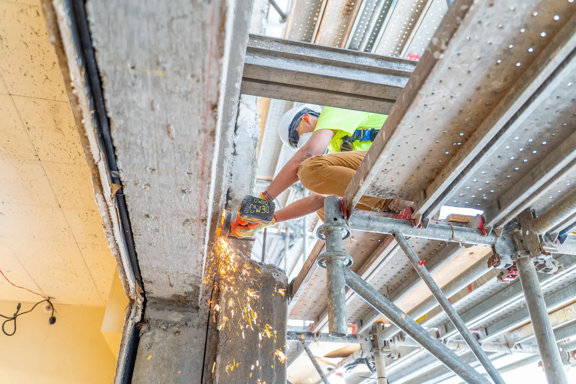 Worker using a power saw