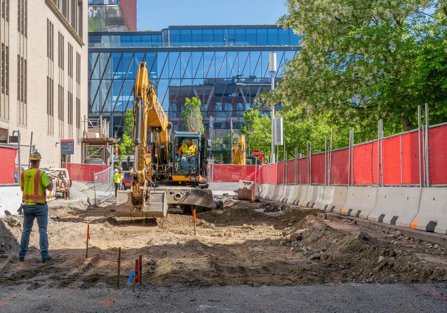 Dirt field with excavator