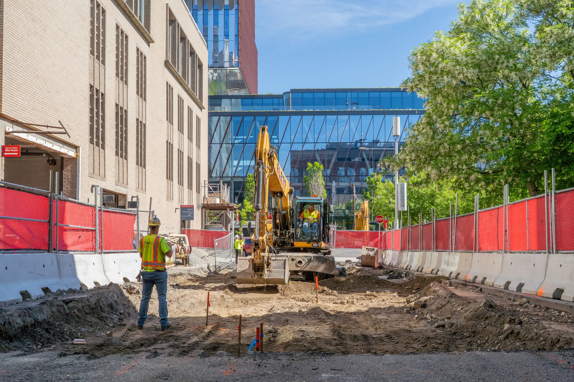 Dirt lot with construction vehicles