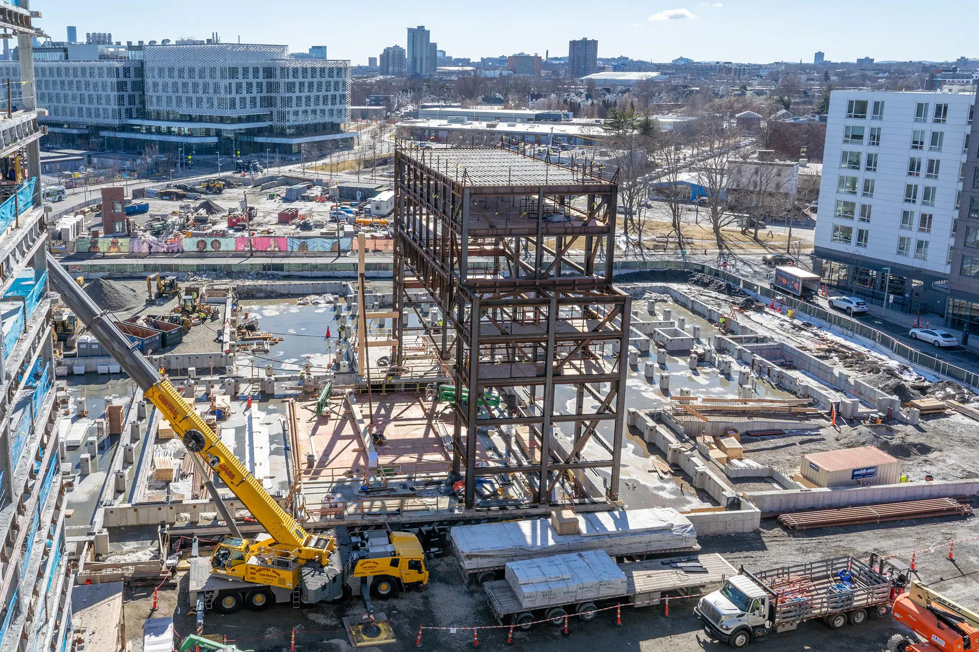 Drone shot of seven story steel frame of Harvard University American Repertory Theatre