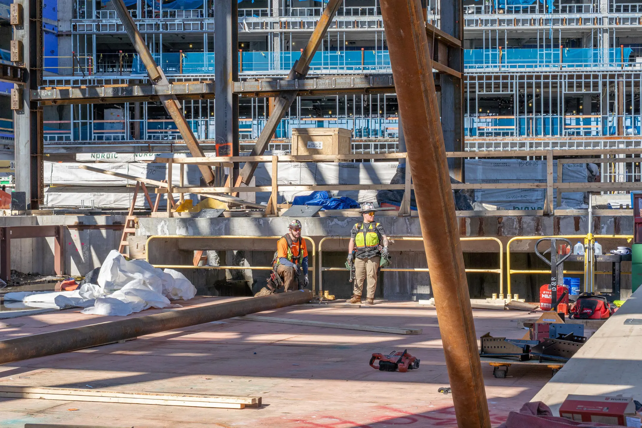 People on multistory building under construction