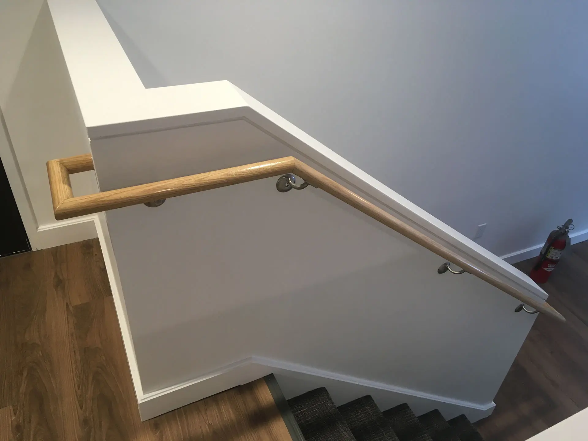 wooden bannister handrail of staircase