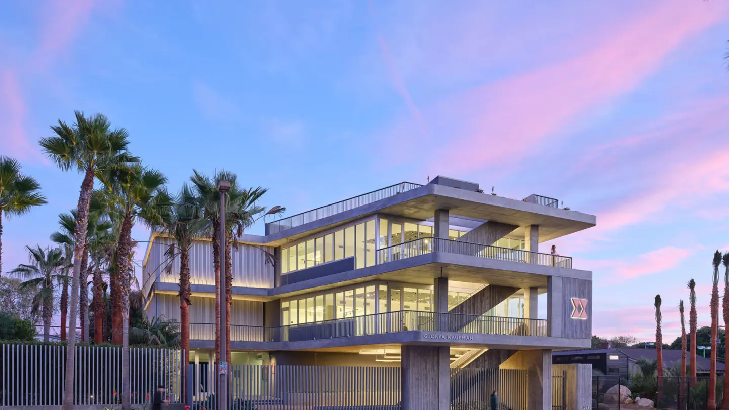 Exterior facade of Glorya Kaufman Creative Center at dusk