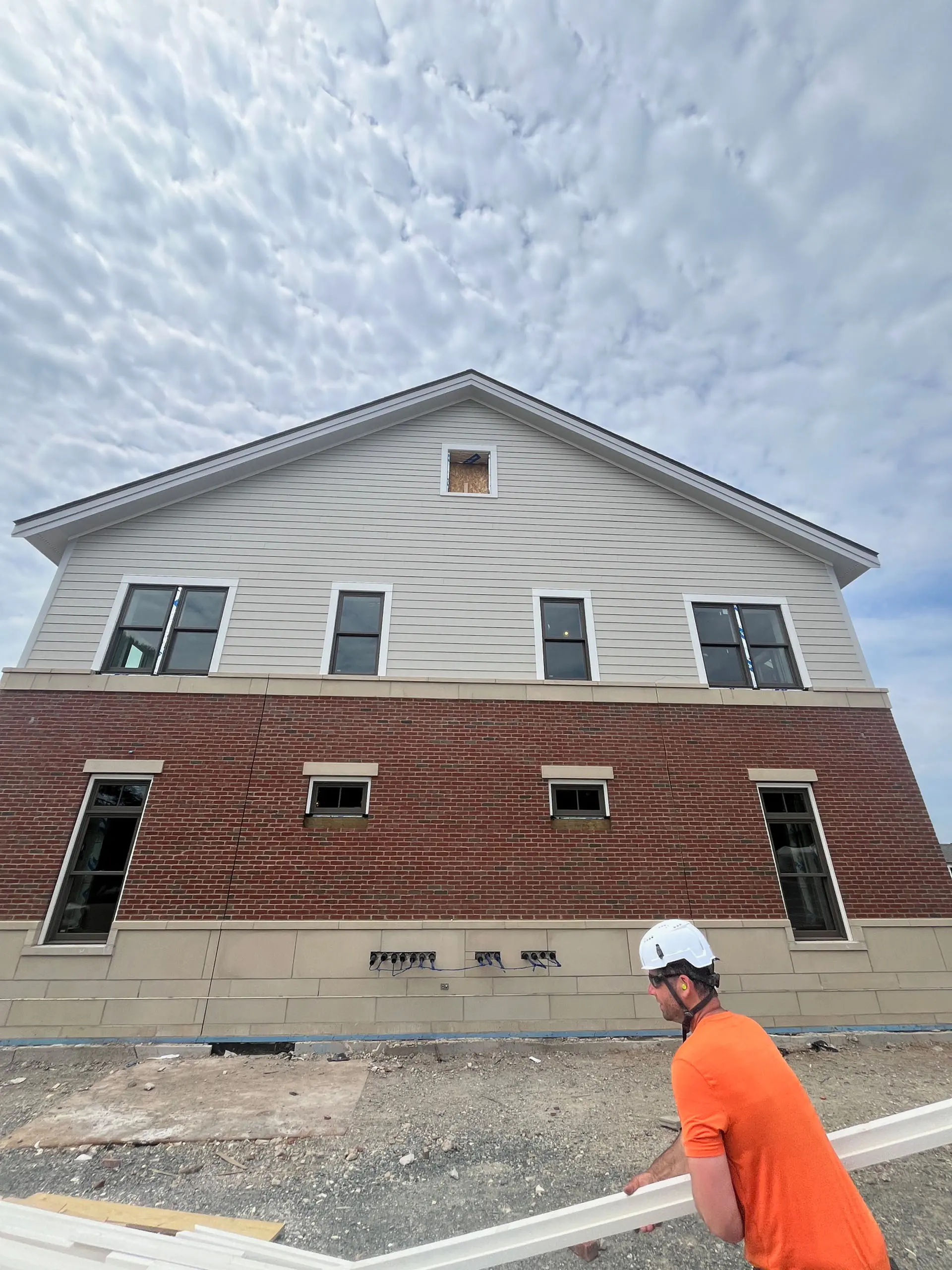 View of end of two story brick and sided Middleton Municipal Complex